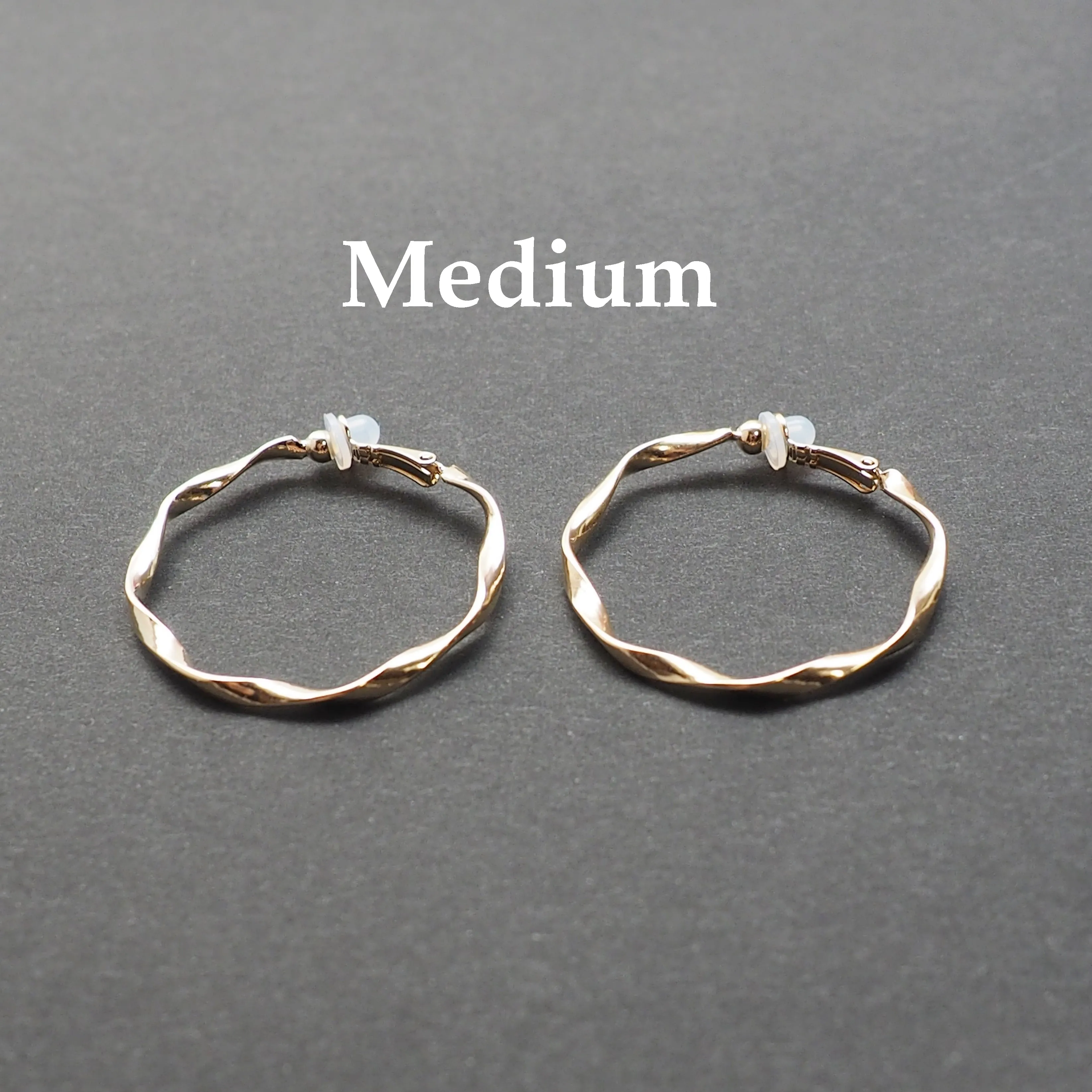 Gold Twisted Clip On Hoop Earrings