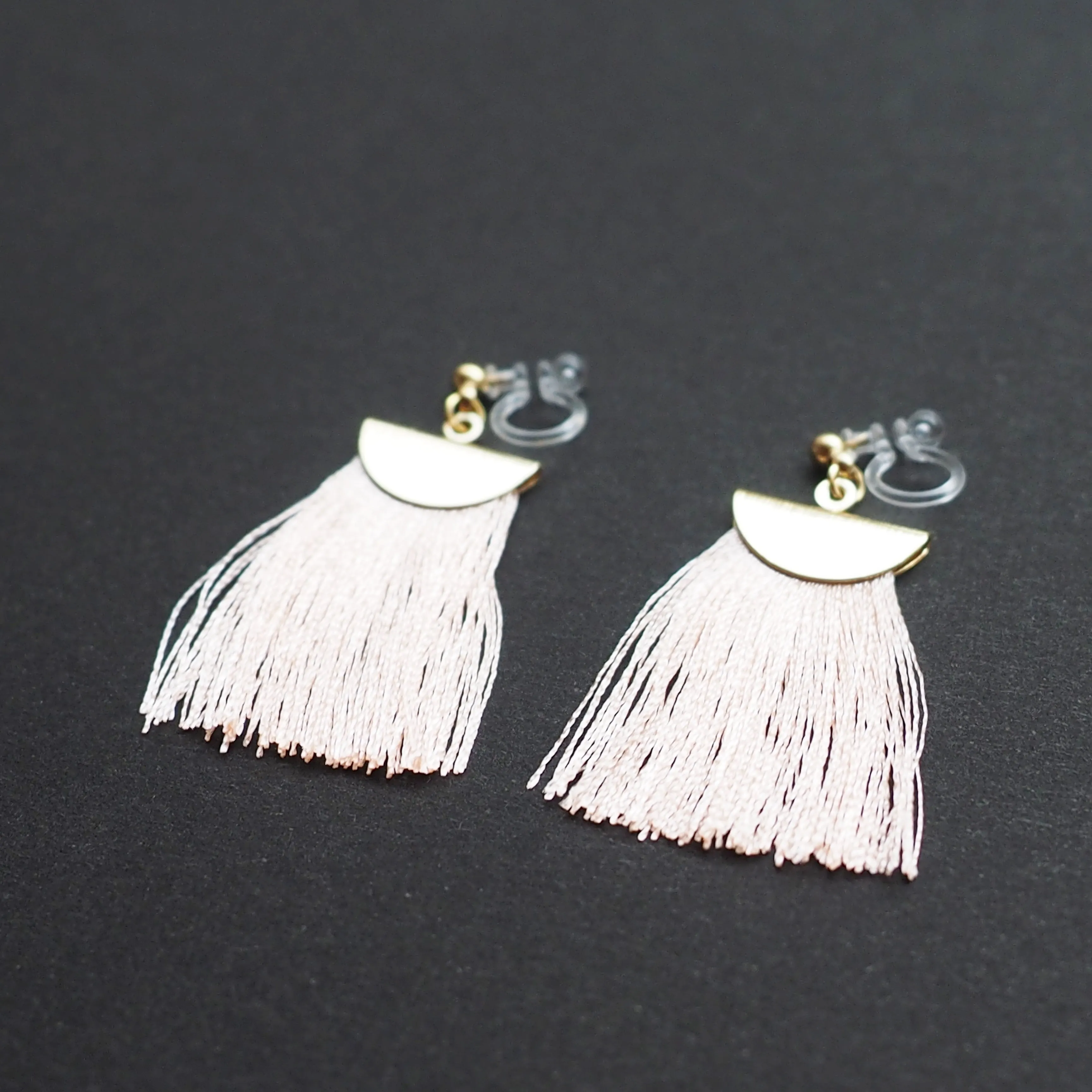 Peachy orange flat tassel invisible clip on earrings